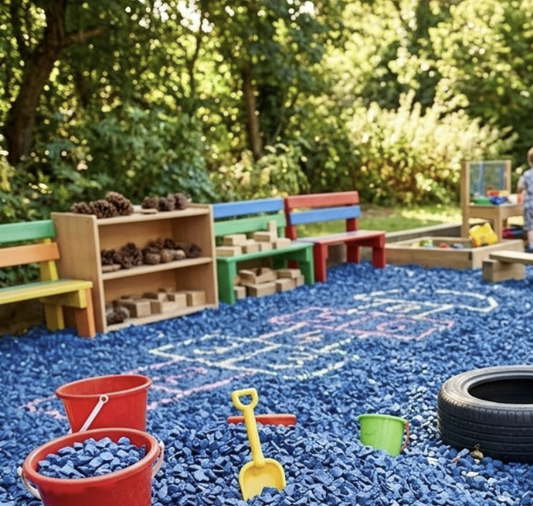 Blue rubber chippings used in outdoor children's play area