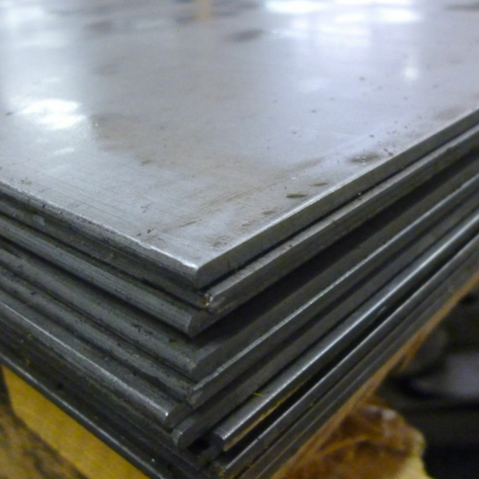 Close-up of S275 mild steel sheet surface and edges