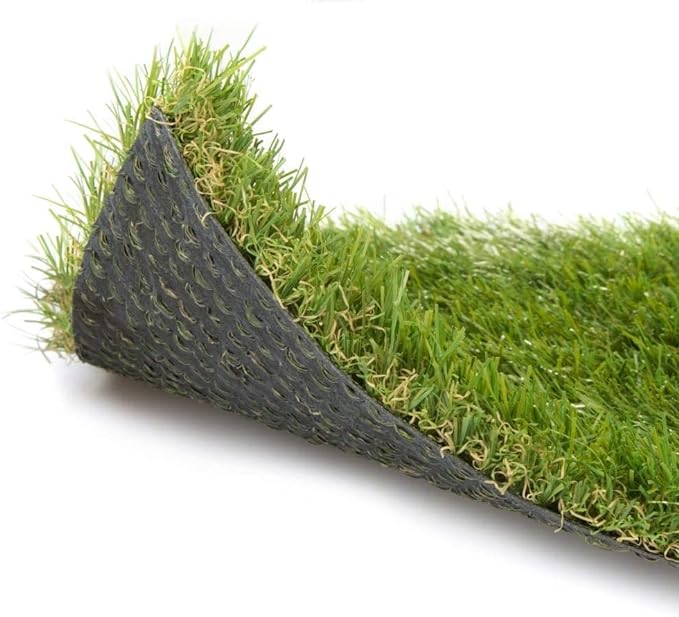 Artificial grass rolls installed in a UK garden lawn area