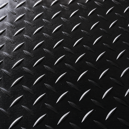 Close-up of black 5 bar rubber flooring anti-slip texture
