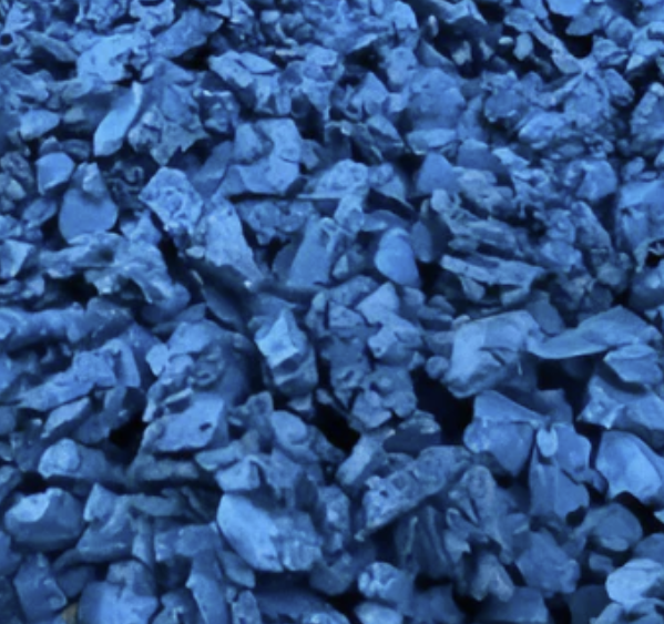Close-up of blue recycled rubber chippings
