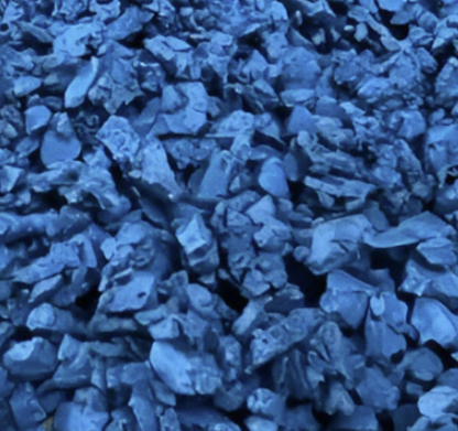 Close-up of blue recycled rubber chippings