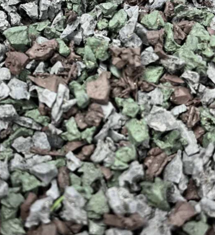 Mixed green and brown rubber mulch for landscaping