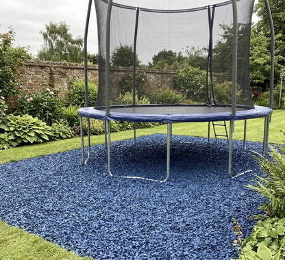 Blue rubber mulch installed beneath trampoline