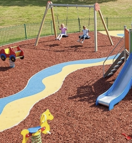 Playground rubber chippings installed in school play area