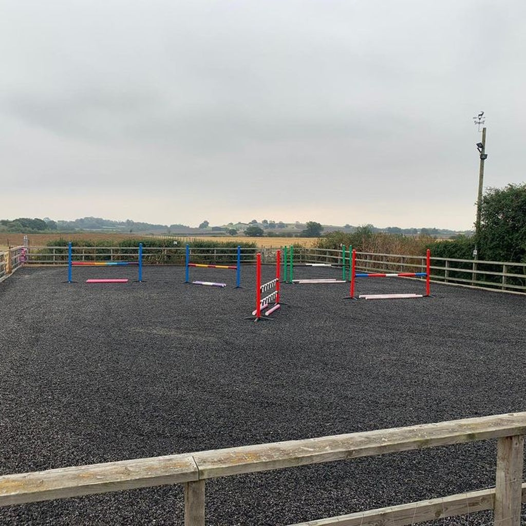 Playground rubber chippings used as equestrian arena surface in UK