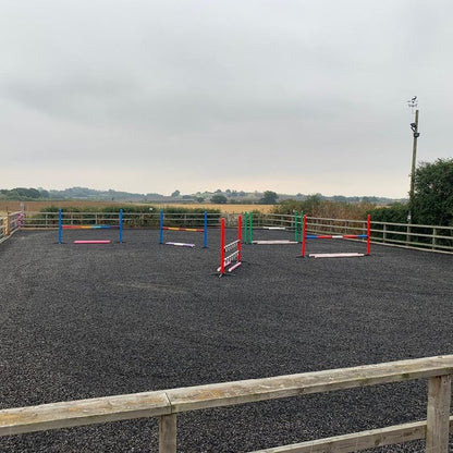Playground rubber chippings used as equestrian arena surface in UK