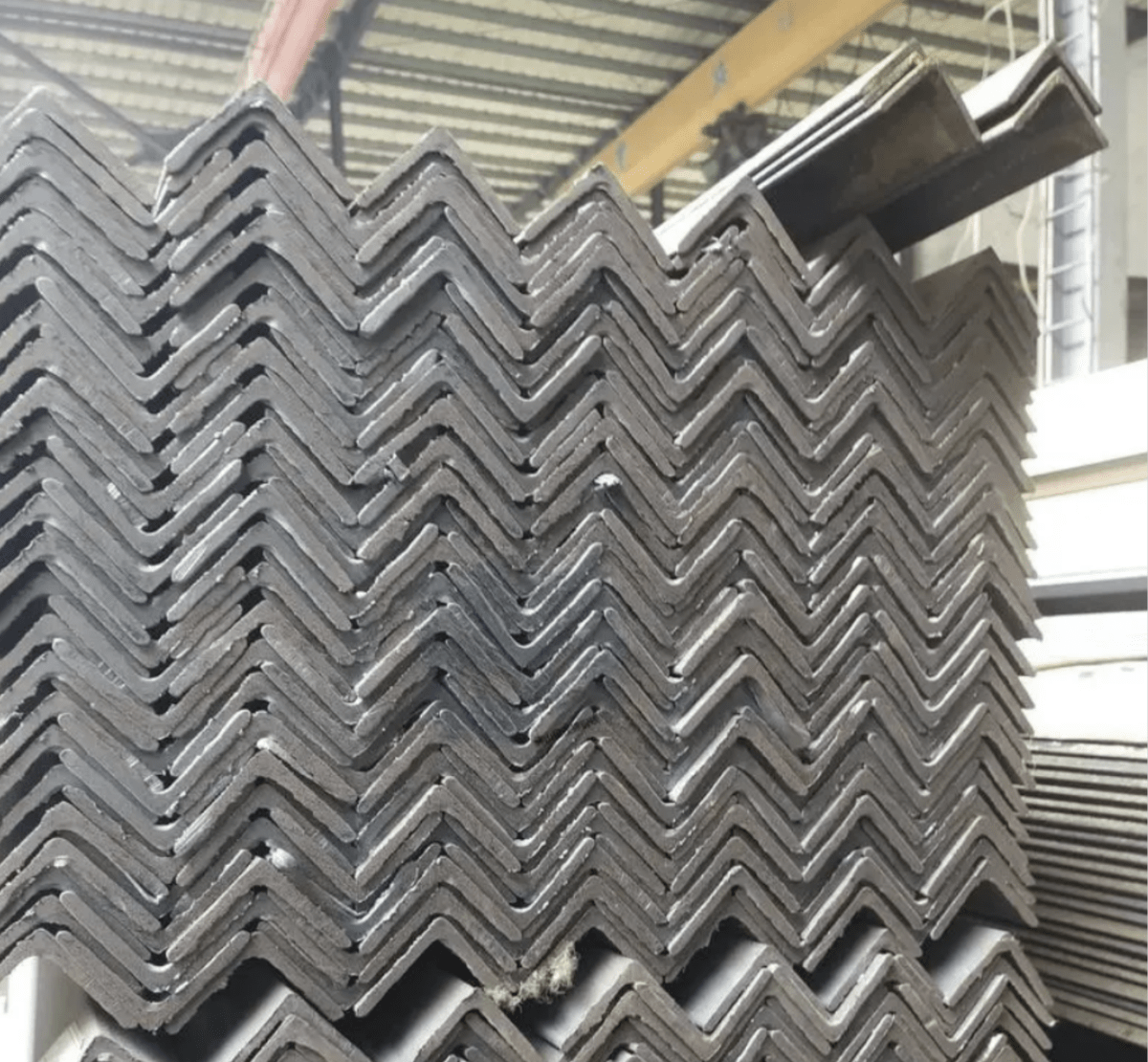 Close-up of galvanised steel angle L-section showing zinc spangle coating