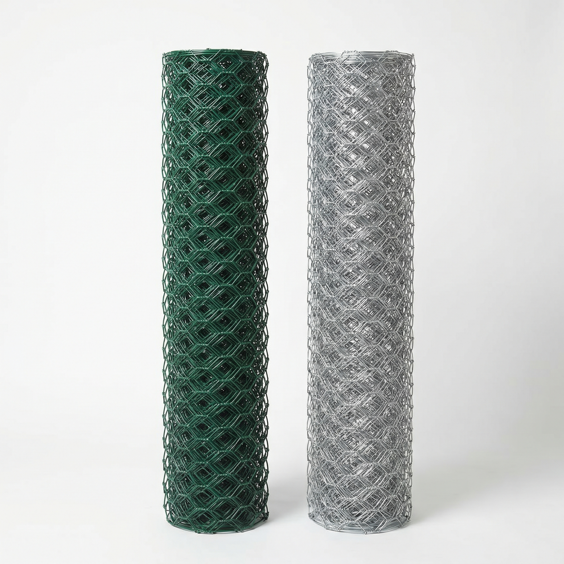 Green PVC-coated and galvanised chicken wire rolls side by side