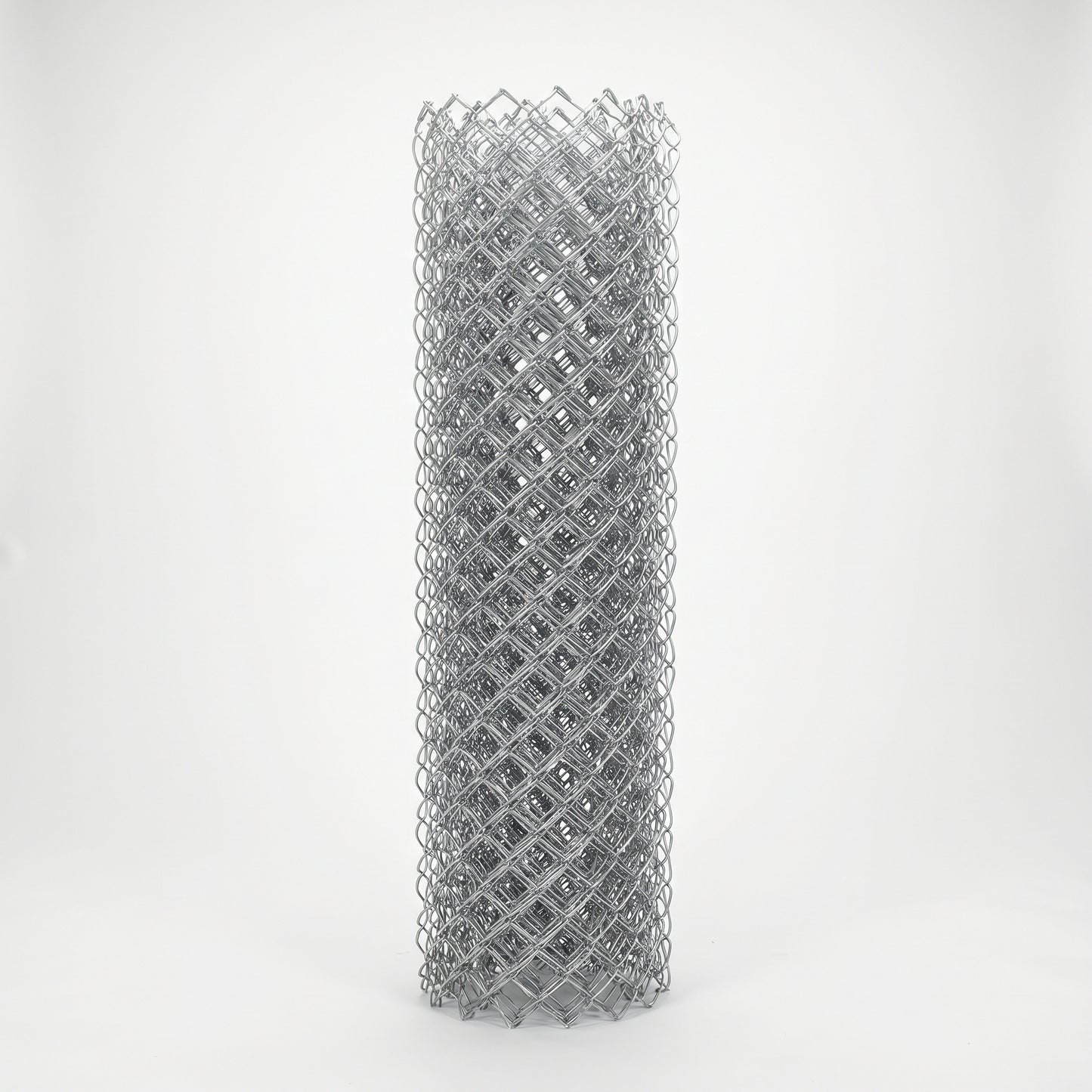 Roll of galvanised chain link fencing on a white studio background