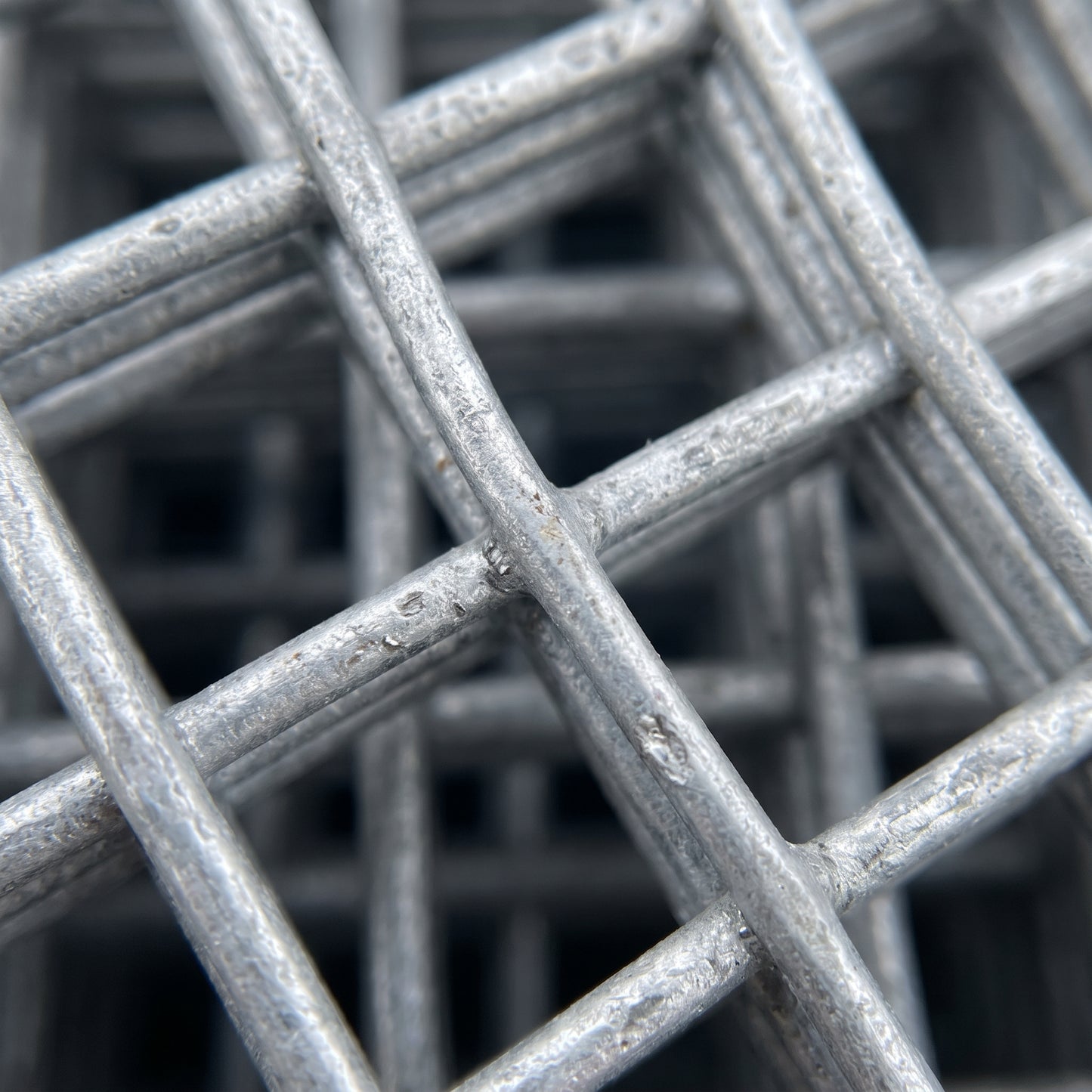 Close-up of 13x13mm galvanised welded wire mesh