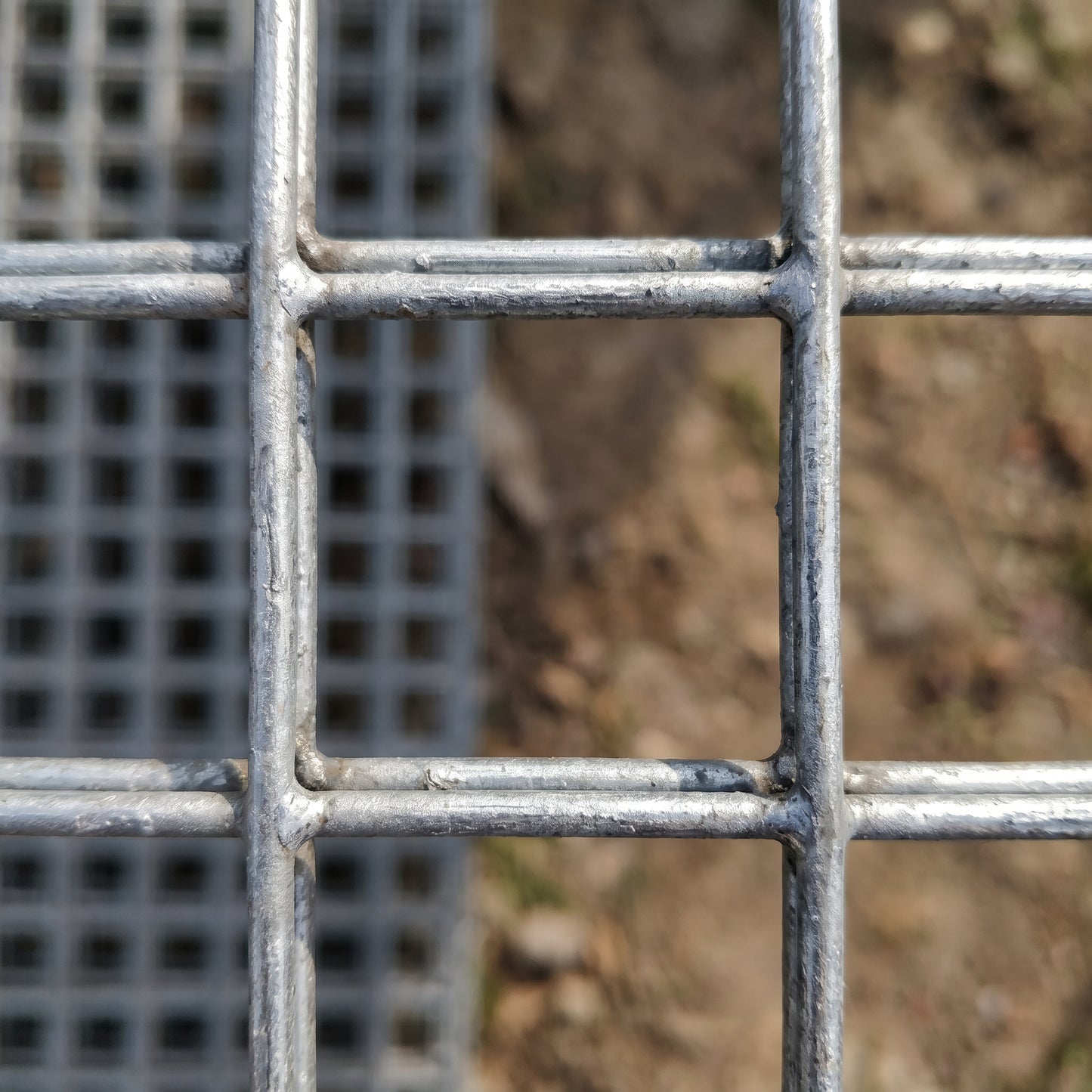 Close-up of 25x25mm galvanised welded wire mesh