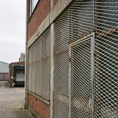 Expanded metal mesh used as a security screen on a UK industrial building