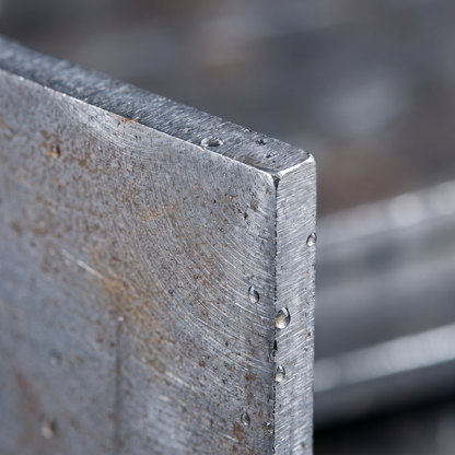 Mild steel sheet cut edge and mill finish close-up - S275 steel plate thickness detail