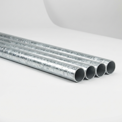 Bundle of hot-dip galvanised steel tubes on a white background
