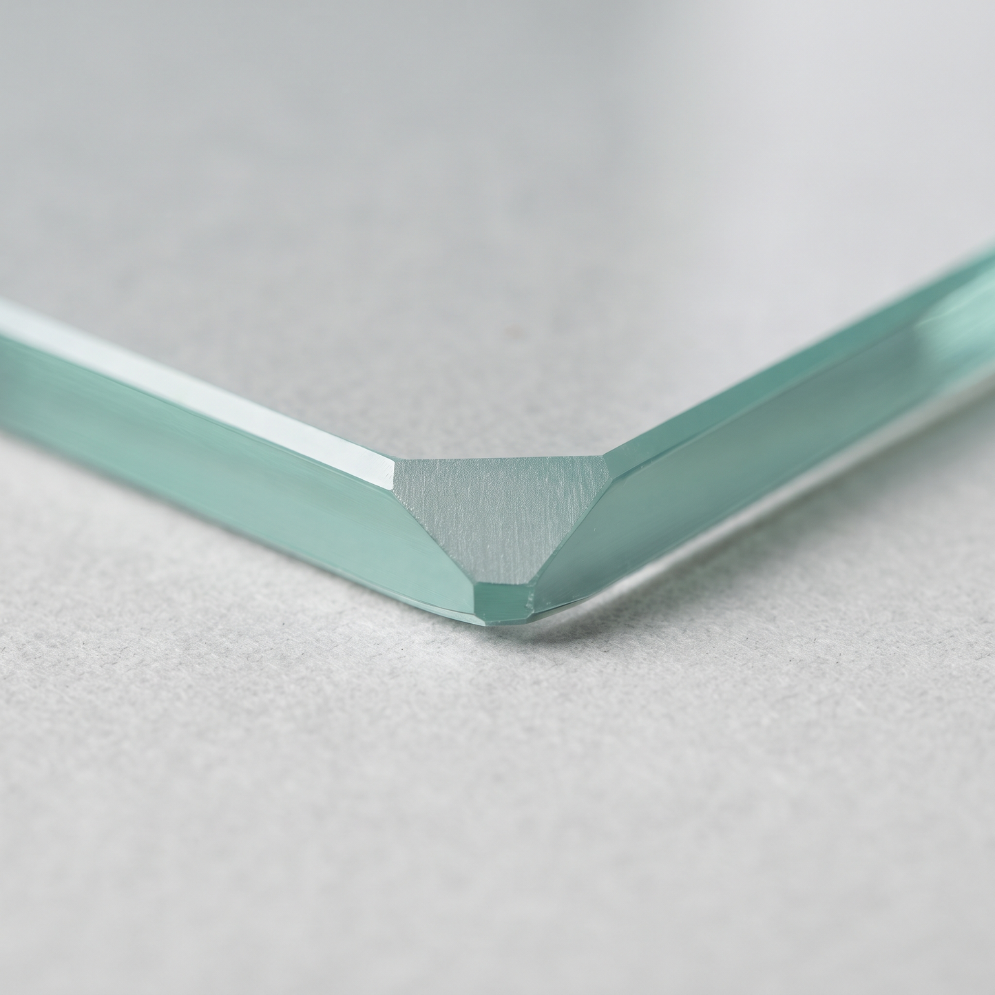 Dubbed corner and polished edge detail of a 15mm toughened glass panel