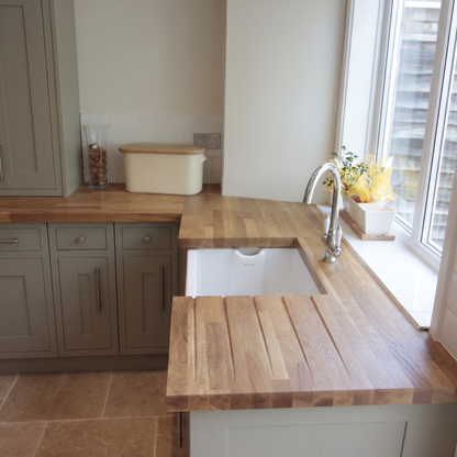 Solid oak breakfast bar installed in kitchen
