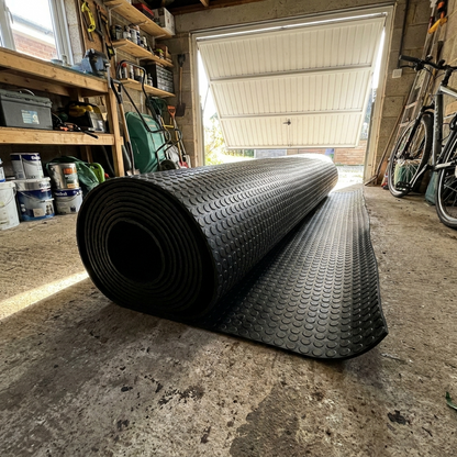5mm coin rubber garage flooring roll 1.5m wide partly unrolled on a garage floor