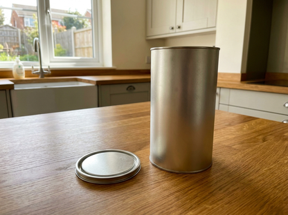 1 litre tin of clear worktop oil on a solid oak worktop