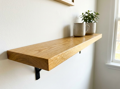 Slim solid oak floating shelf with a square edge
