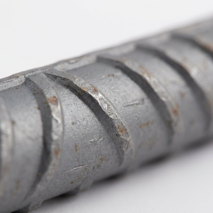 Close-up of ribbed steel rebar surface B500B deformation pattern