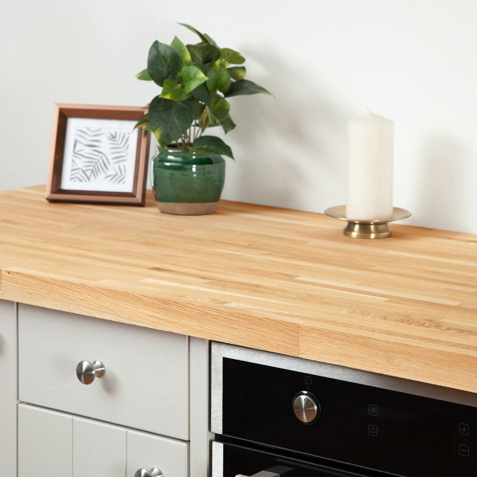 Solid oak 27mm kitchen worktop installed in a modern UK kitchen