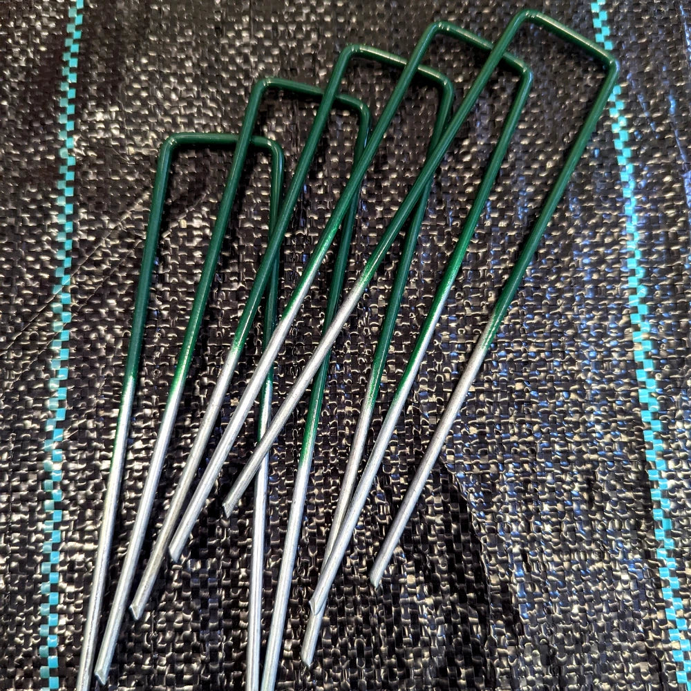 Securing pegs for weed control membrane