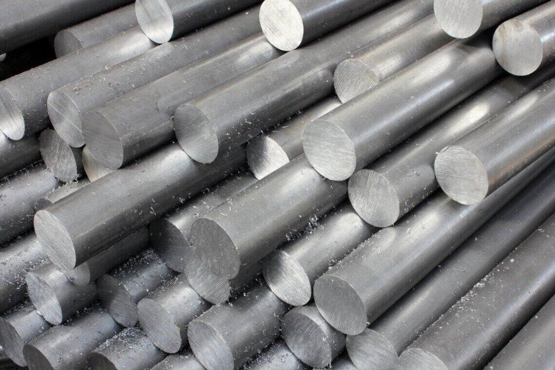 Close-up of mild steel round bar cut end showing solid round section